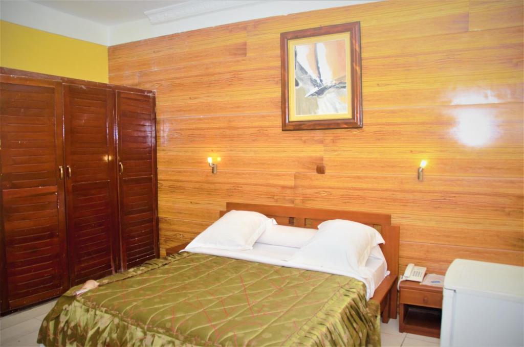 Postel nebo postele na pokoji v ubytování Hotel - Y
