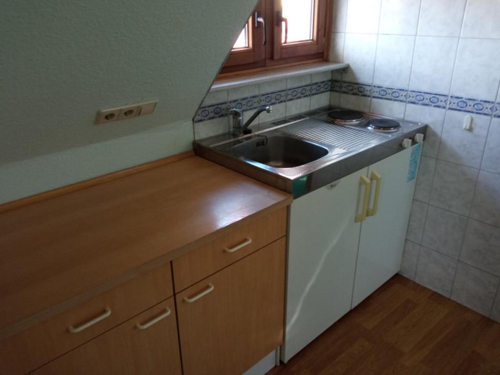 Kuchyň nebo kuchyňský kout v ubytování Landhotel Waldschänke