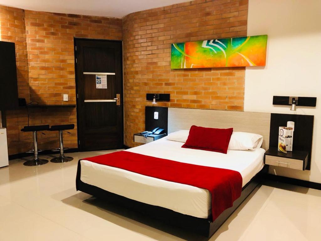Postel nebo postele na pokoji v ubytování Hotel Toscana Oriente