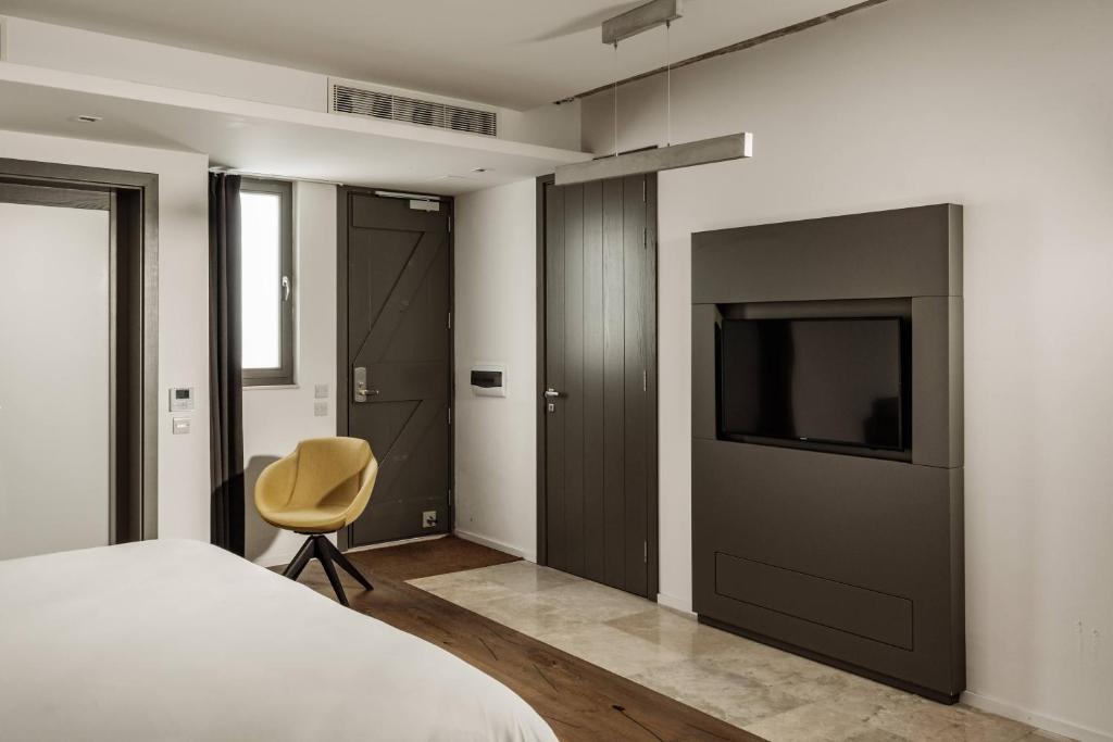 TV a/nebo společenská místnost v ubytování 19 ROOMS