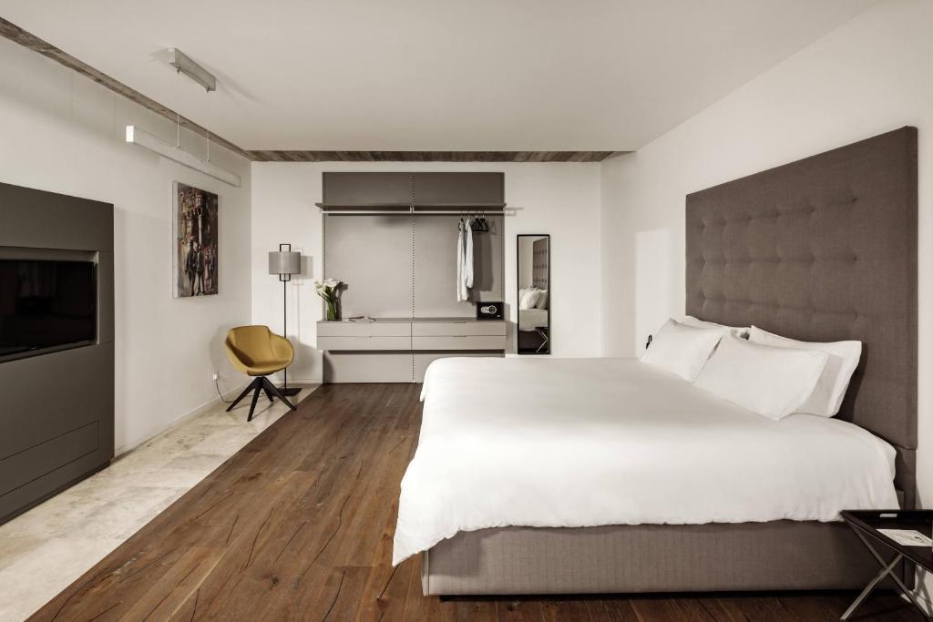 Postel nebo postele na pokoji v ubytování 19 ROOMS