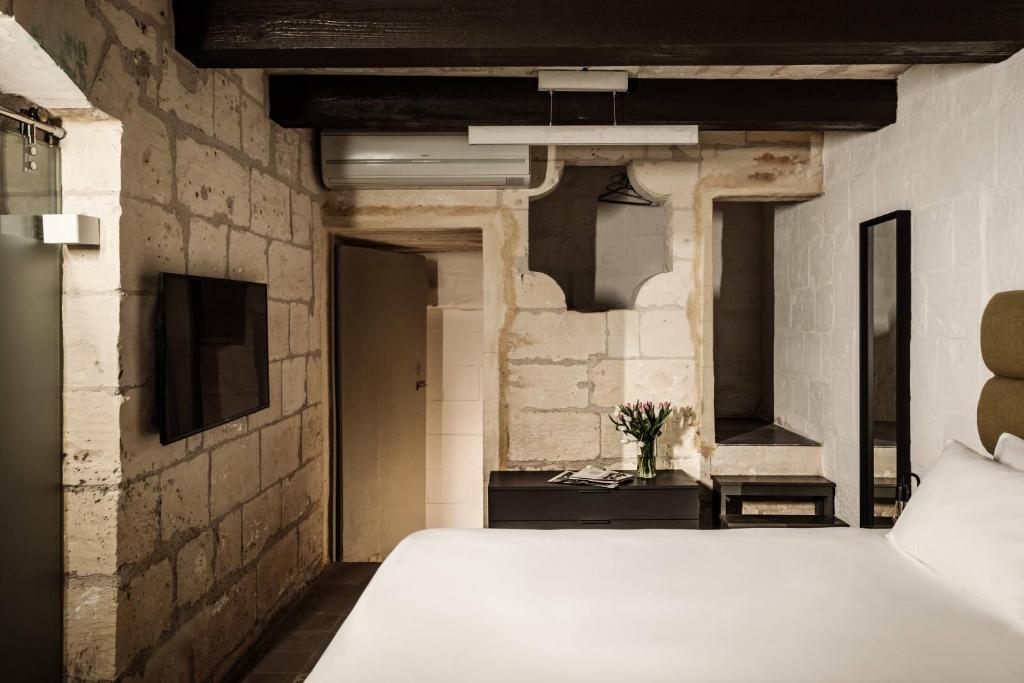 Postel nebo postele na pokoji v ubytování 19 ROOMS