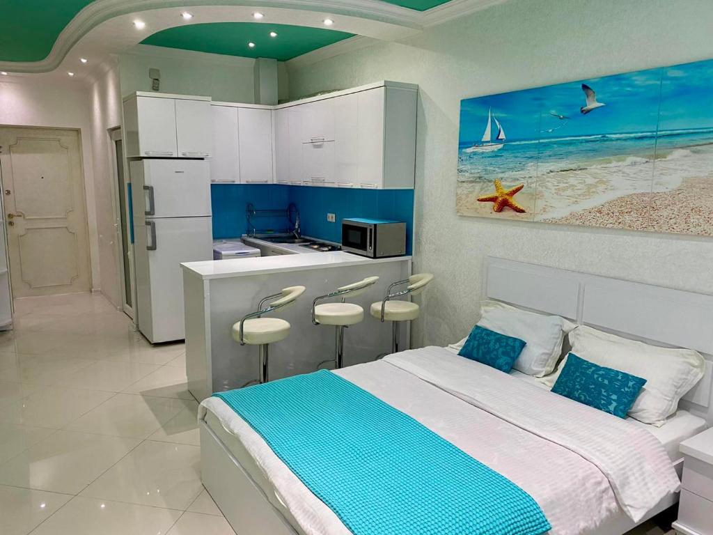 ครัวหรือมุมครัวของ Batumi-Studio 482