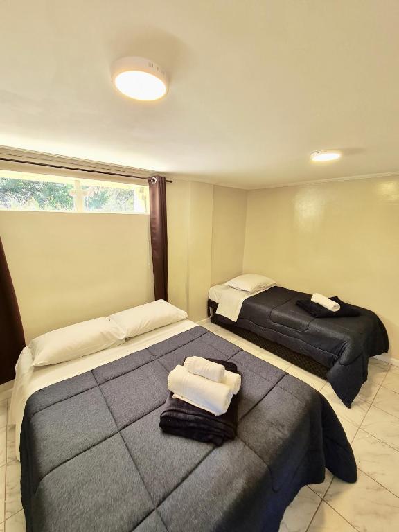  Tiny house nova dois quartos e excelente internet e varanda