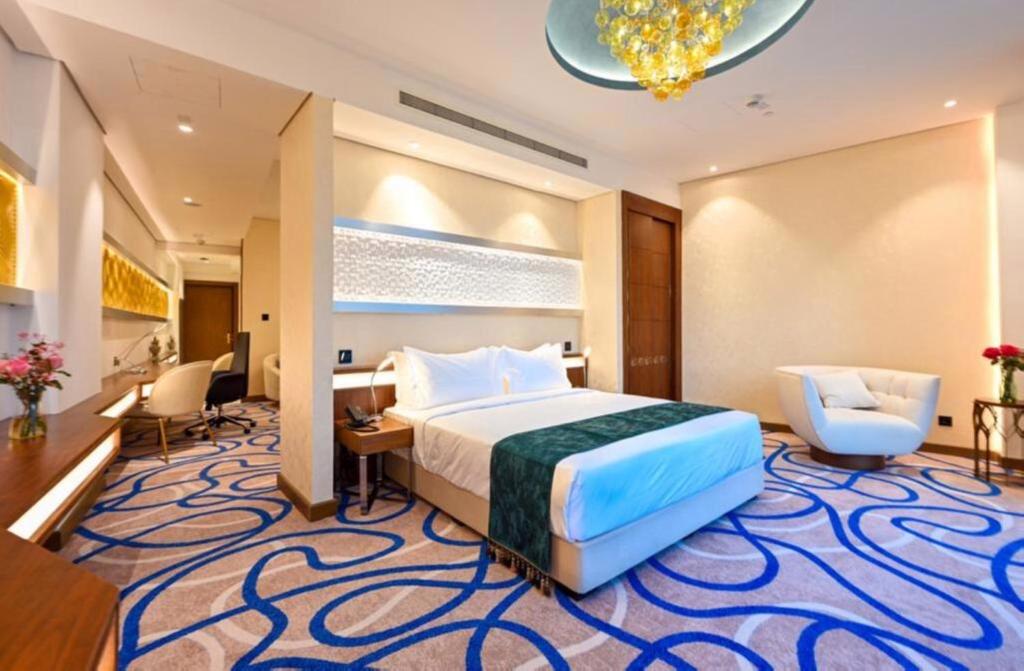 Katil atau katil-katil dalam bilik di Cielo Hotel Lusail Qatar