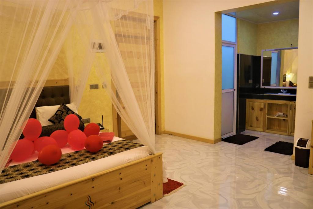TV a/nebo společenská místnost v ubytování Hotel Ella`s Edge