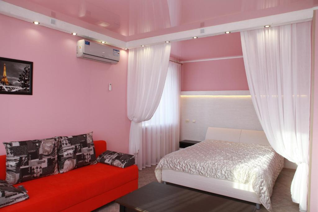 מיטה או מיטות בחדר ב-Apartment in Lipetsk