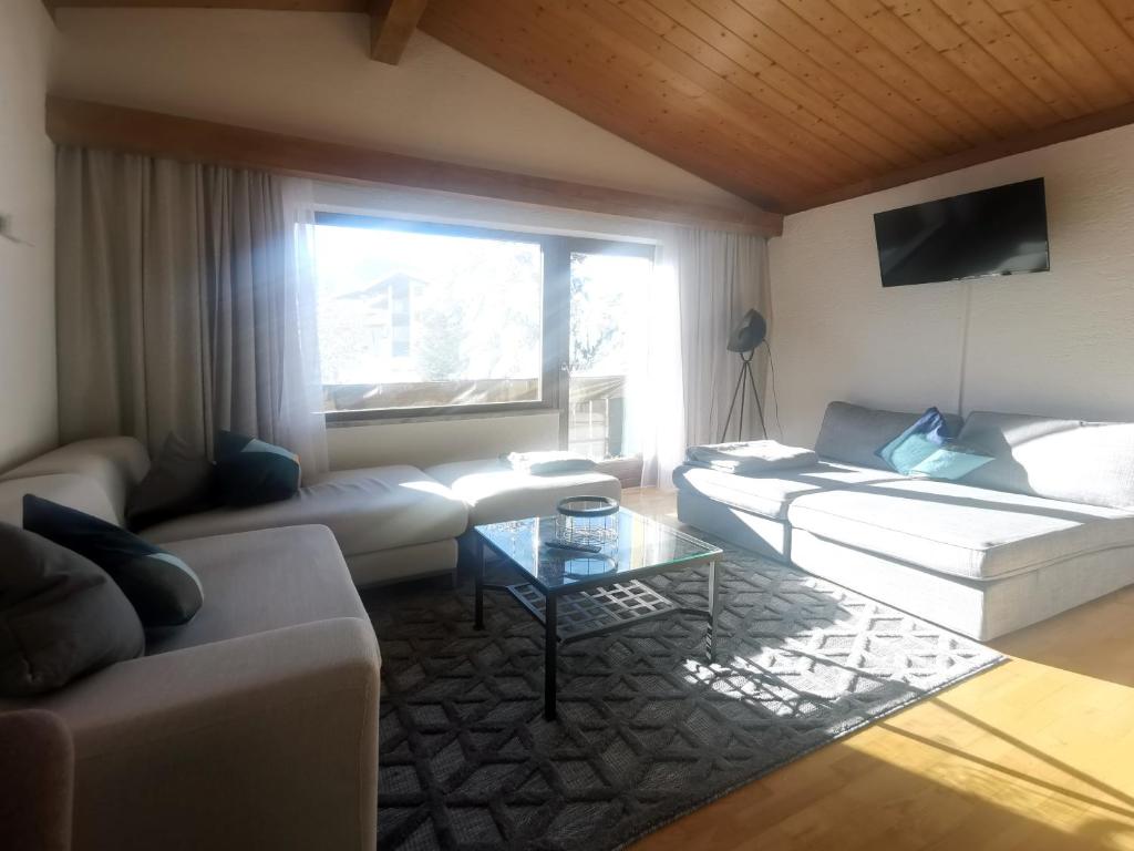 Część wypoczynkowa w obiekcie The Seefeld Retreat - Central Family Friendly Apartments - Mountain Views