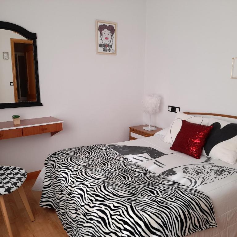 Postel nebo postele na pokoji v ubytování Hostal "Los Chanos el Ruso"
