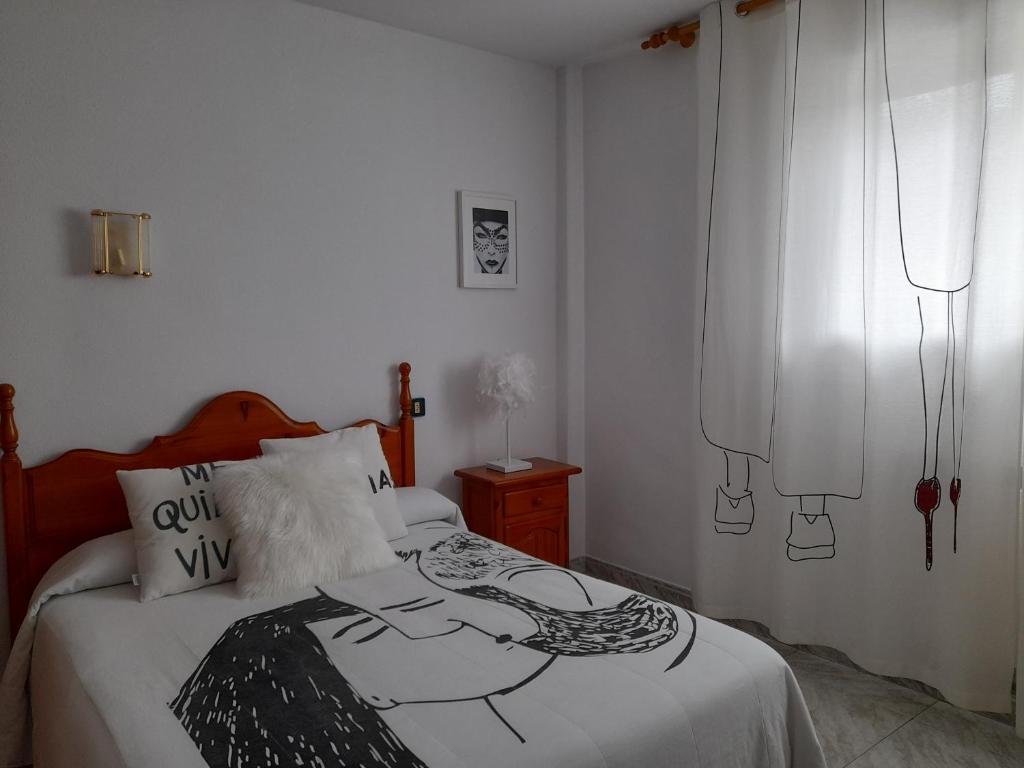 Postel nebo postele na pokoji v ubytování Hostal "Los Chanos el Ruso"