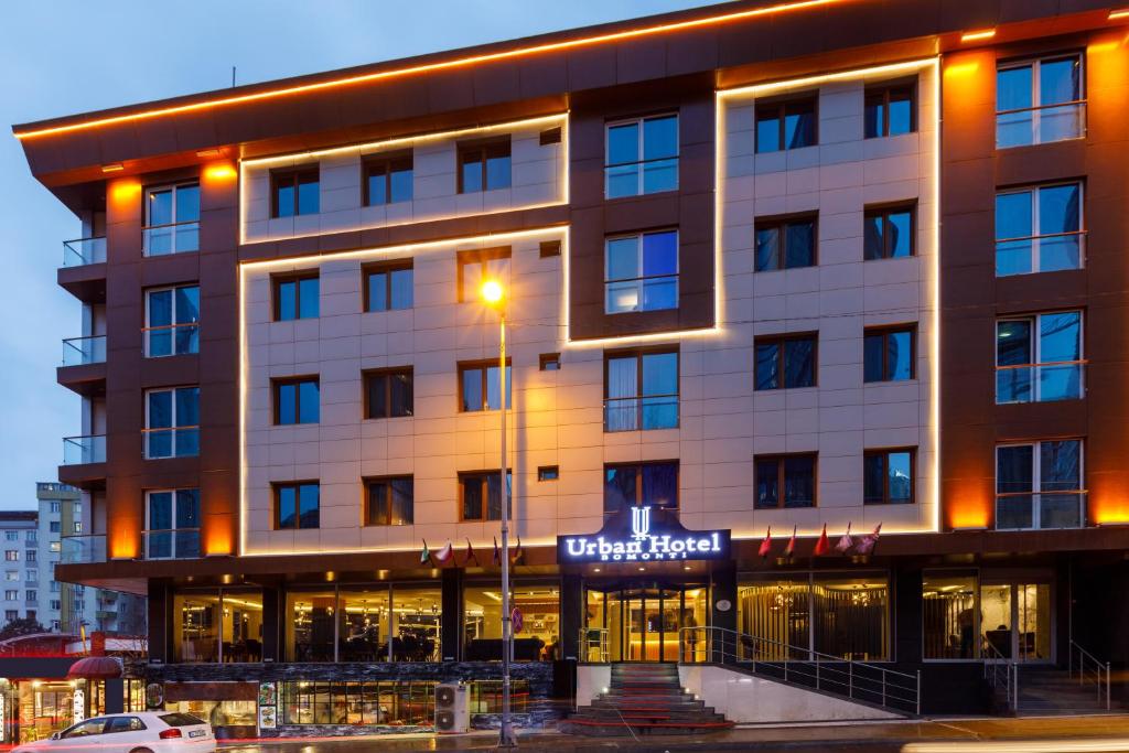 a hotel building with a sign on it at Urban Hotel Bomonti in Istanbul