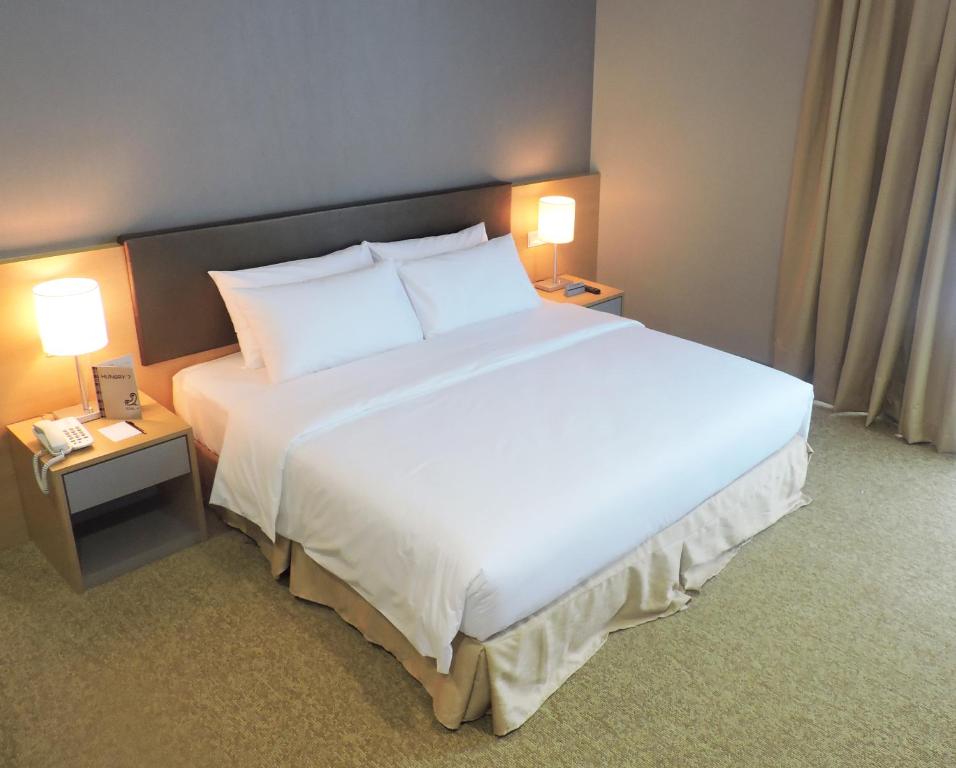 Postel nebo postele na pokoji v ubytování Hotel N°5