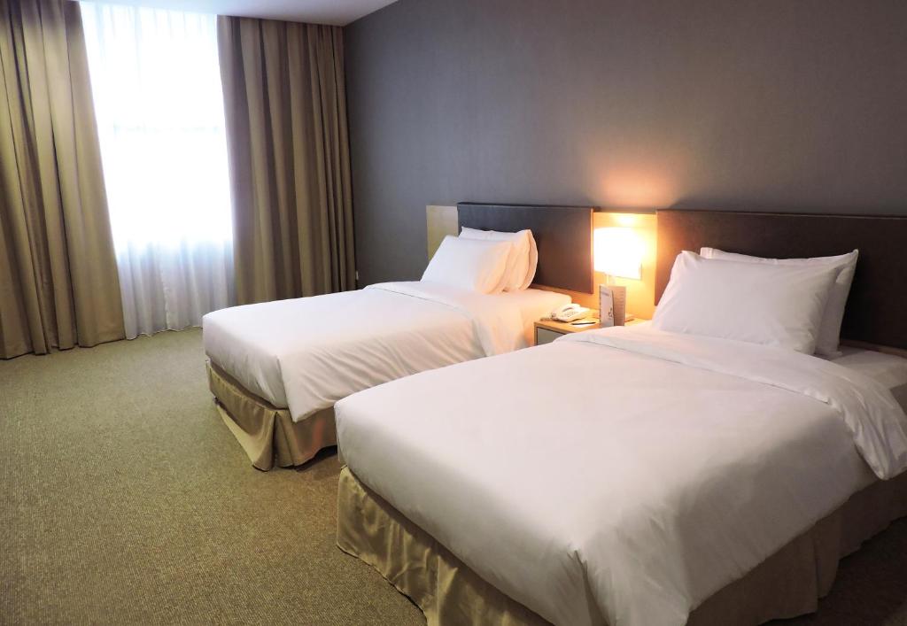 Postel nebo postele na pokoji v ubytování Hotel N°5