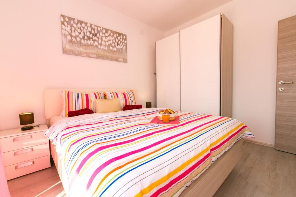 Posteľ alebo postele v izbe v ubytovaní House Pink