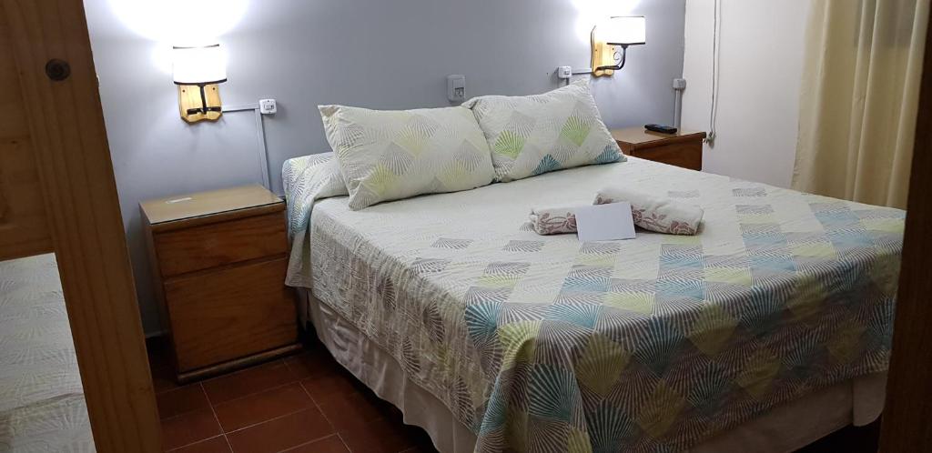 Cama o camas de una habitación en Nuevo Hotel City