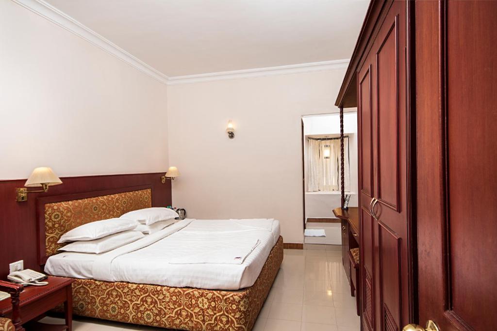 Postel nebo postele na pokoji v ubytování Hotel Raindrops