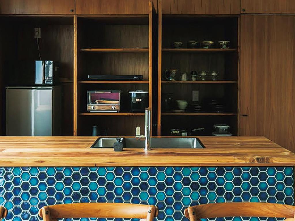 Η κουζίνα ή μικρή κουζίνα στο CHULAX OKINAWA YOMITAN【Designer Condominium Hotel】