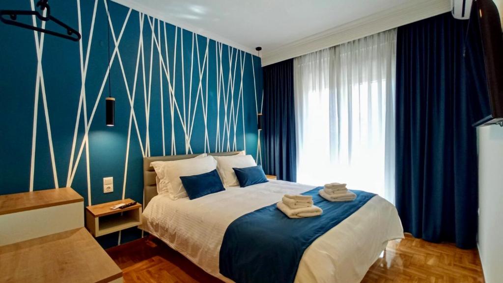 Posteľ alebo postele v izbe v ubytovaní EPaN Luxury Apartments