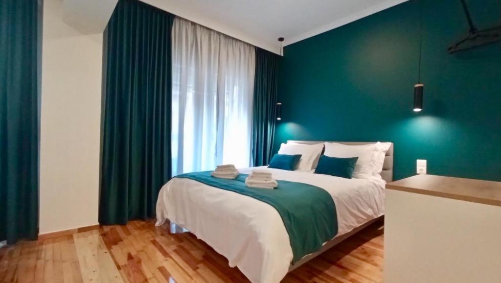 Posteľ alebo postele v izbe v ubytovaní EPaN Luxury Apartments