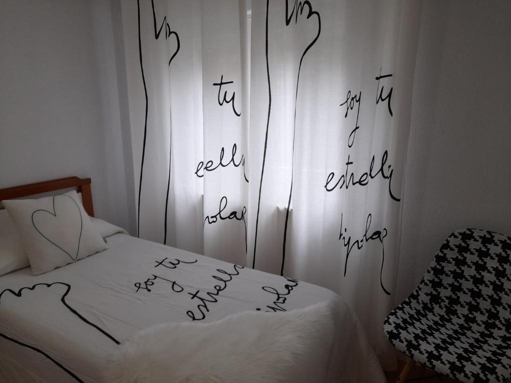 Postel nebo postele na pokoji v ubytování Hostal "Los Chanos el Ruso"