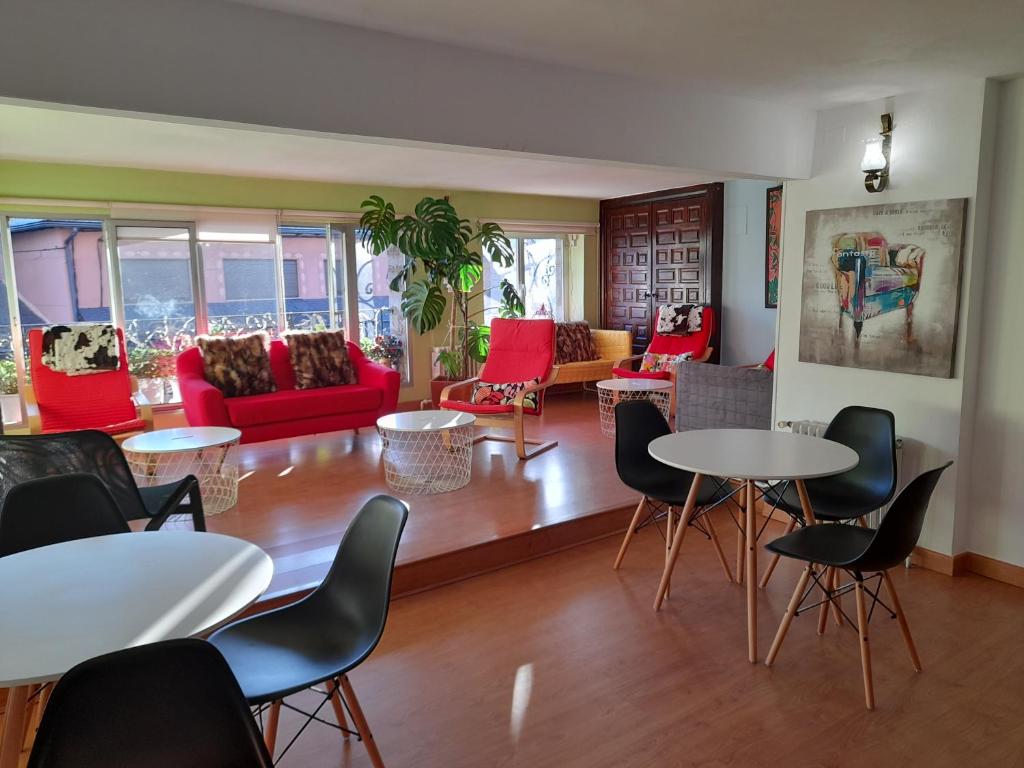 Posezení v ubytování Hostal "Los Chanos el Ruso"
