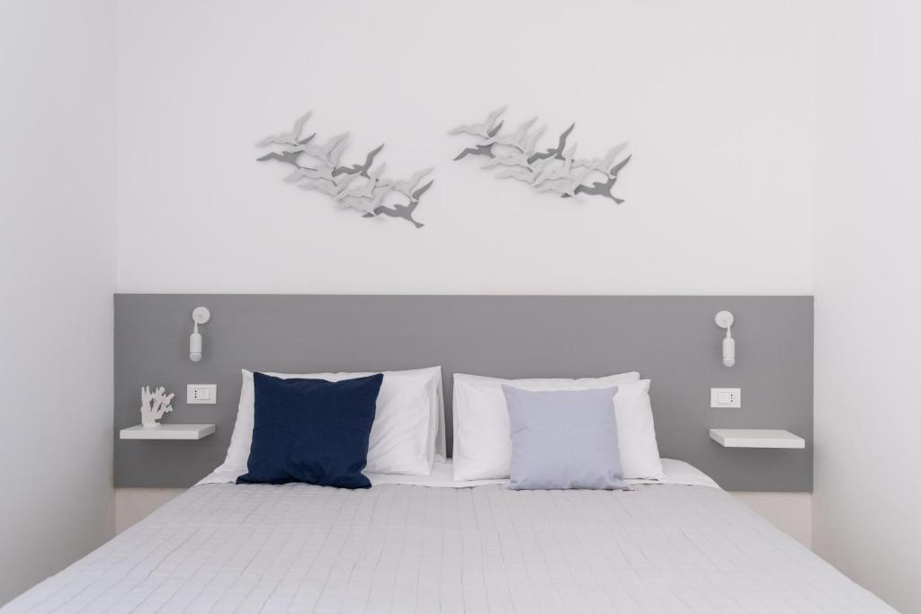 Posteľ alebo postele v izbe v ubytovaní B&B Villa Sara