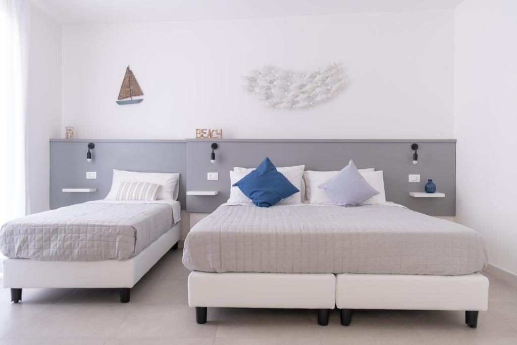 Posteľ alebo postele v izbe v ubytovaní B&B Villa Sara