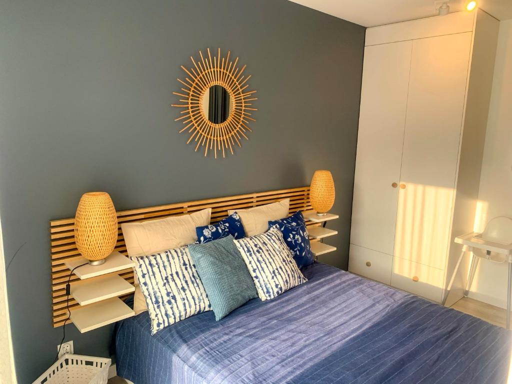 Postel nebo postele na pokoji v ubytování La Riva Mia Apartamenty