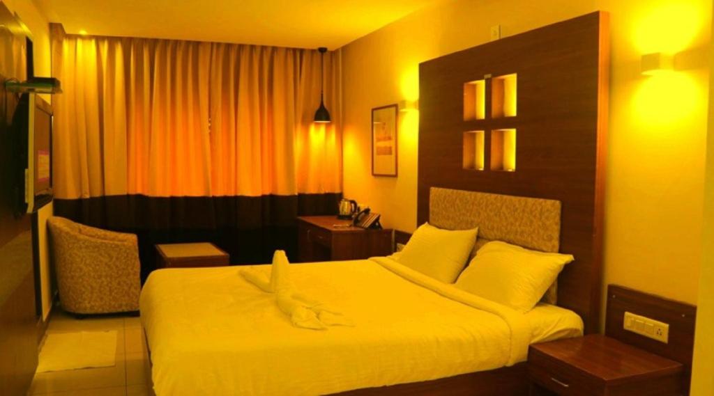 Postel nebo postele na pokoji v ubytování Klase Hotels