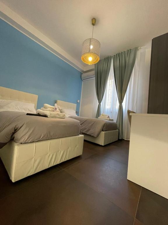 Posteľ alebo postele v izbe v ubytovaní Relais Petruzzelli