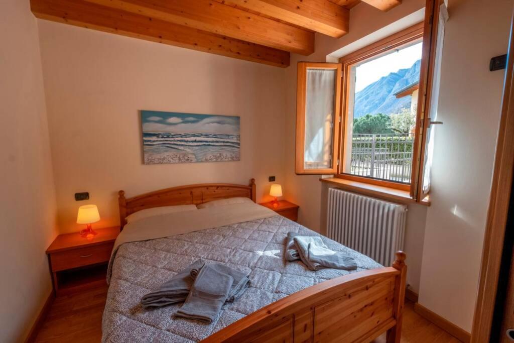 Postel nebo postele na pokoji v ubytování Happy Guest Apartments - Feel The Lake