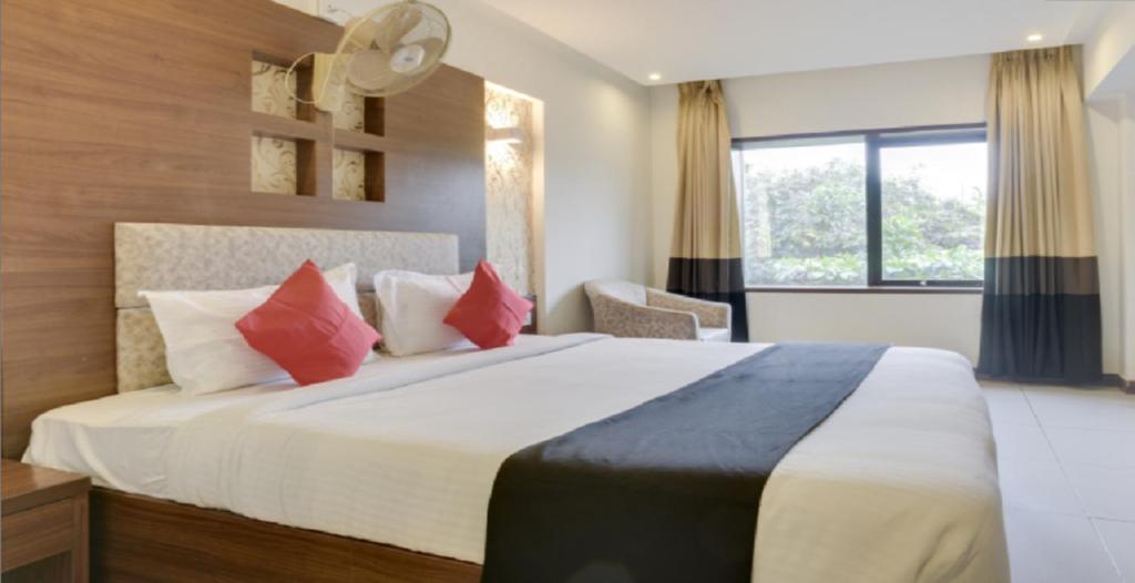 Postel nebo postele na pokoji v ubytování Klase Hotels