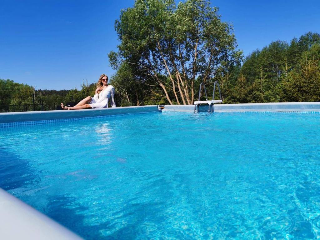 Bazén v ubytovaní Water House - Domy Mazur alebo v jeho blízkosti