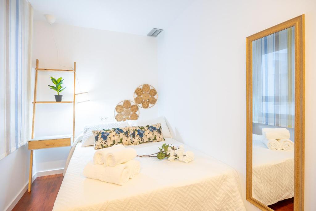 Posteľ alebo postele v izbe v ubytovaní Expoholidays-Apartamentos Almería Centro PARKING gratis