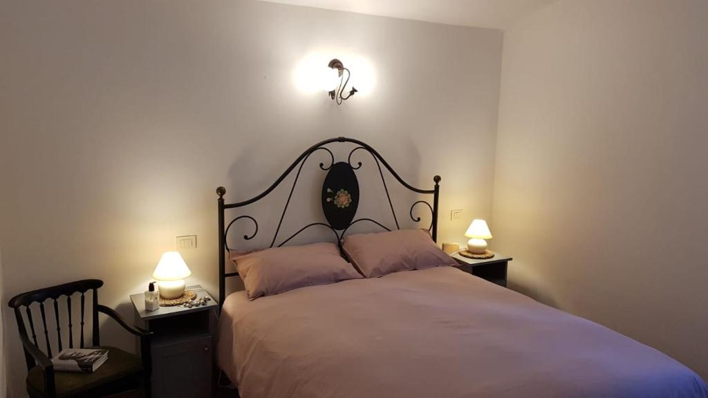 A bed or beds in a room at Casa Michelle "Natura e Relax"