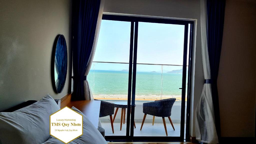 Giường trong phòng chung tại TMS Quy Nhơn Luxury Homestay