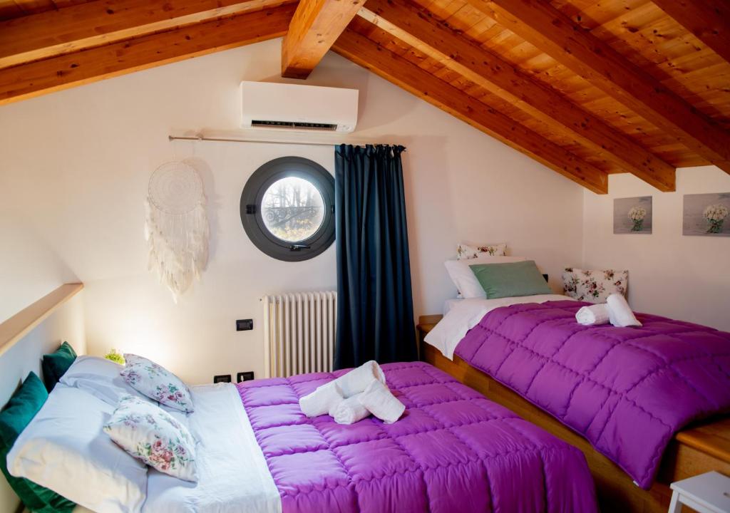 Postel nebo postele na pokoji v ubytování Stella Marina 6