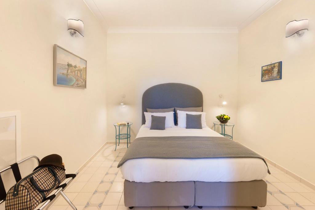 Postel nebo postele na pokoji v ubytování Rosa Magra Guest House