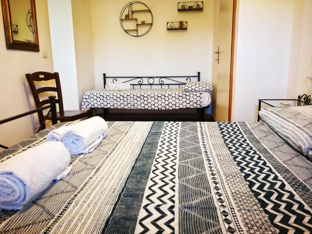 Кровать или кровати в номере Bed & Bike Casa dei Papi