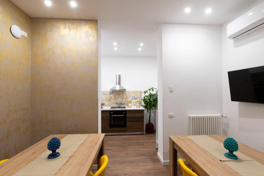 TV a/nebo společenská místnost v ubytování Fervore Luxury Rooms