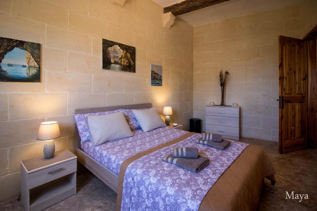 Postel nebo postele na pokoji v ubytování VinDor Villa