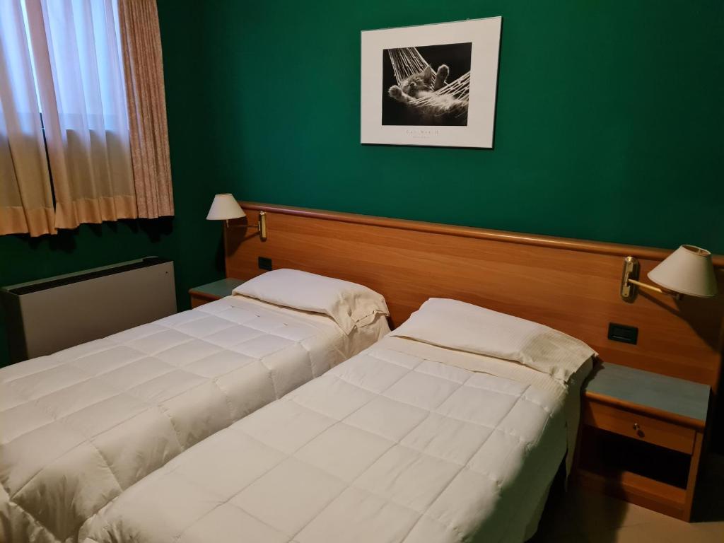 Postel nebo postele na pokoji v ubytování Modo Hotel