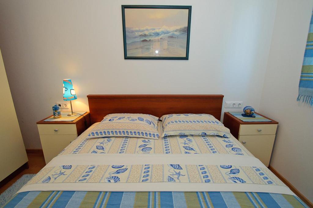 Voodi või voodid majutusasutuse Žigulin Apartment toas