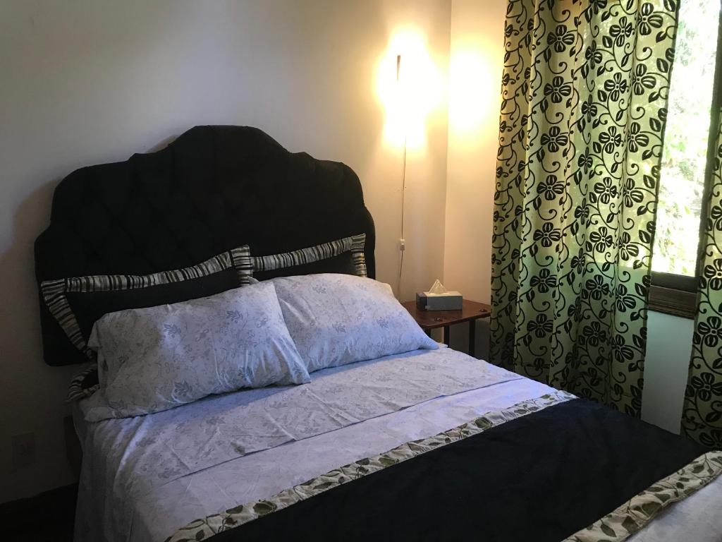 Postel nebo postele na pokoji v ubytování COTTON HOUSE DE LABRADOR