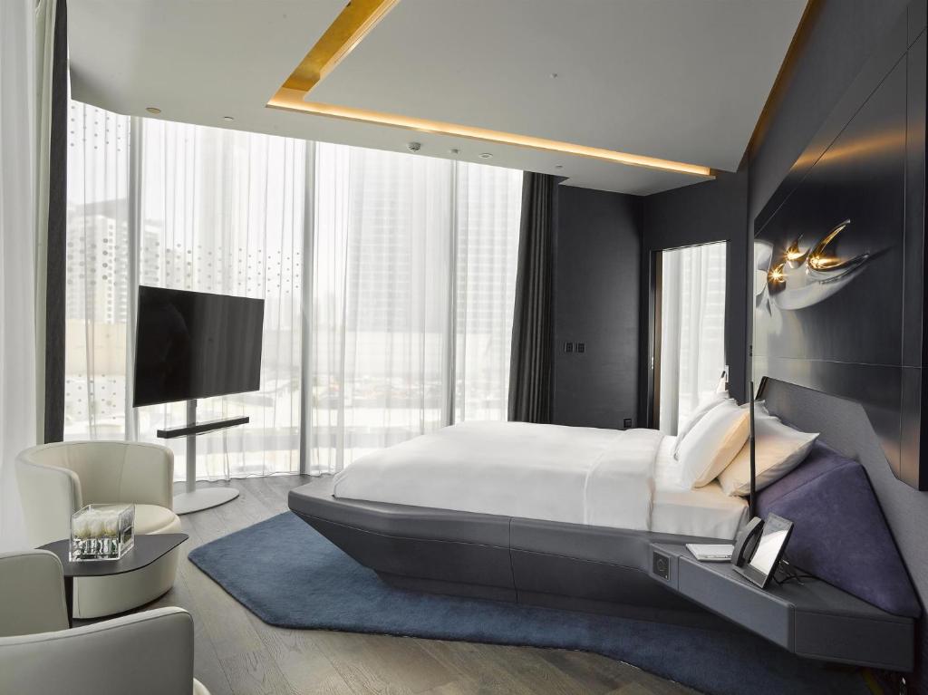 Postel nebo postele na pokoji v ubytování ME Dubai by Meliá