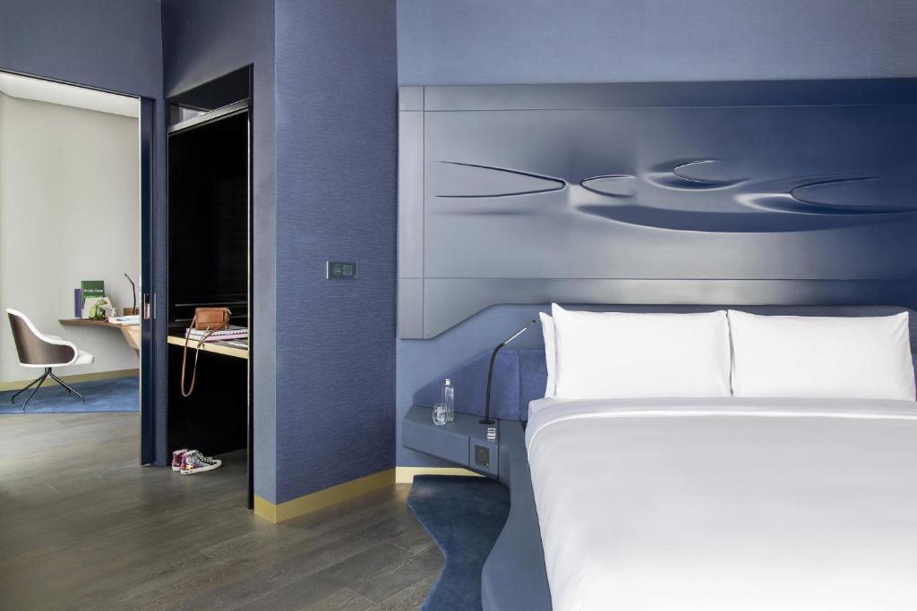 Postel nebo postele na pokoji v ubytování ME Dubai by Meliá