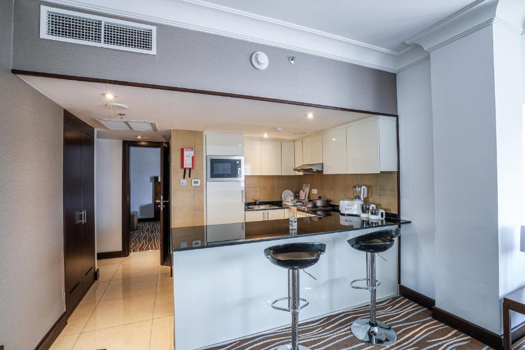 Кухня или мини-кухня в Copthorne Downtown by Millennium
