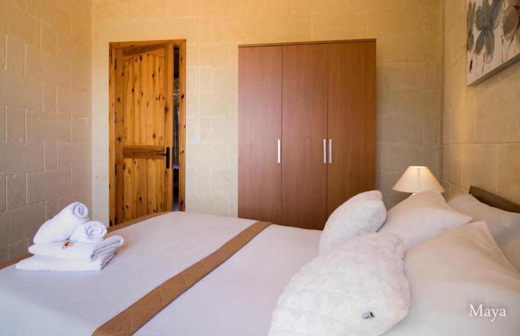 Postel nebo postele na pokoji v ubytování VinDor Villa