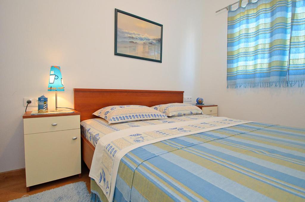 Voodi või voodid majutusasutuse Žigulin Apartment toas