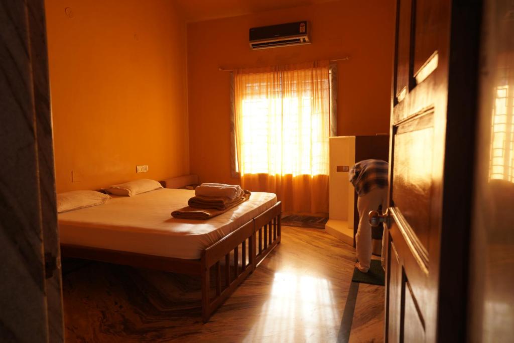 Una cama o camas en una habitación de Jungle by sturmfrei Vagator